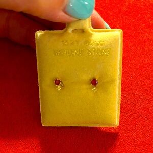 Ruby and diamond earrings set in 14K gold